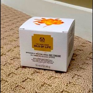 A brand new Oil of Life moisturizer cream, The Body Shop. Still in the package